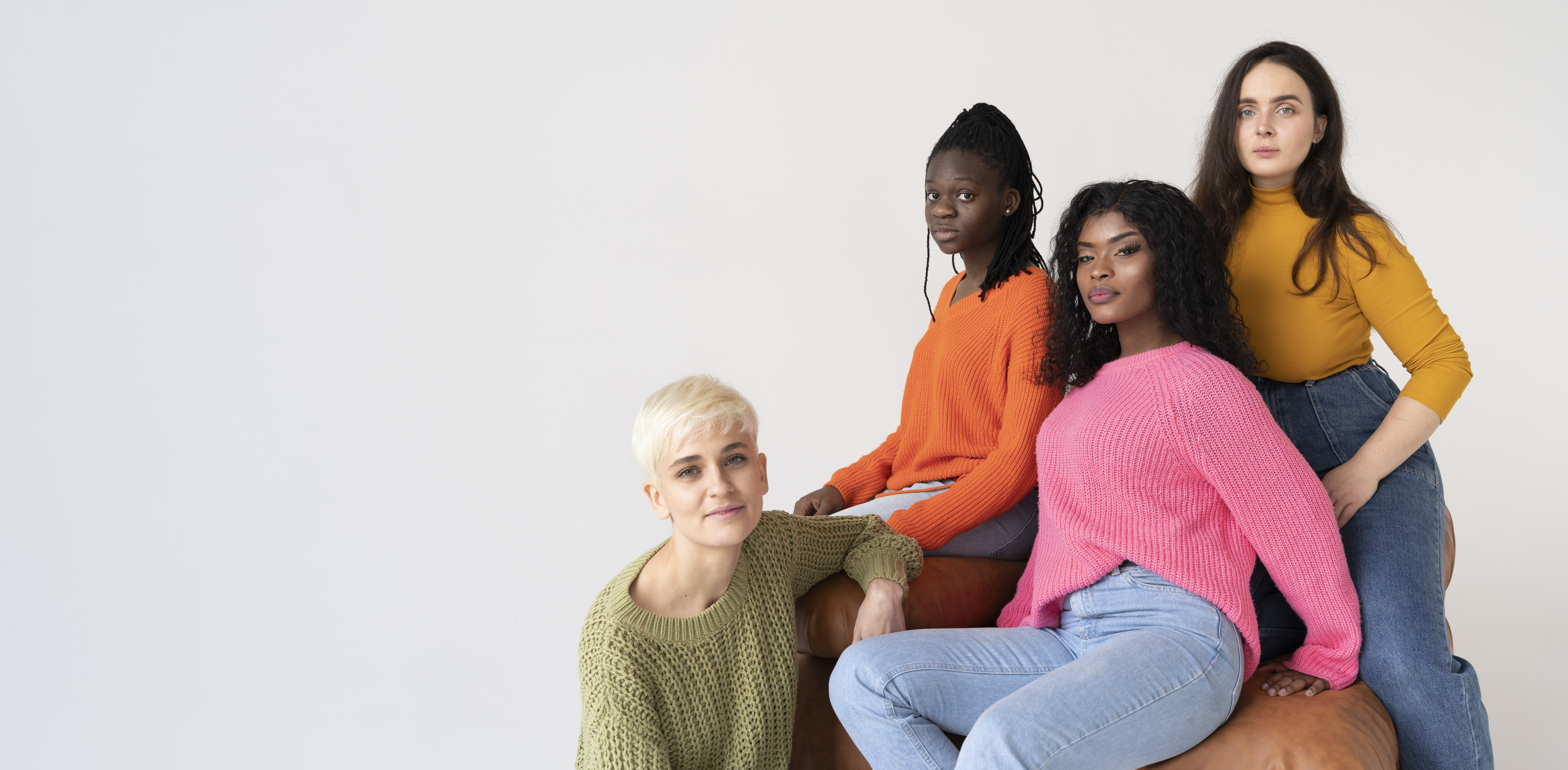 Diverse women standing together — HerBraces community